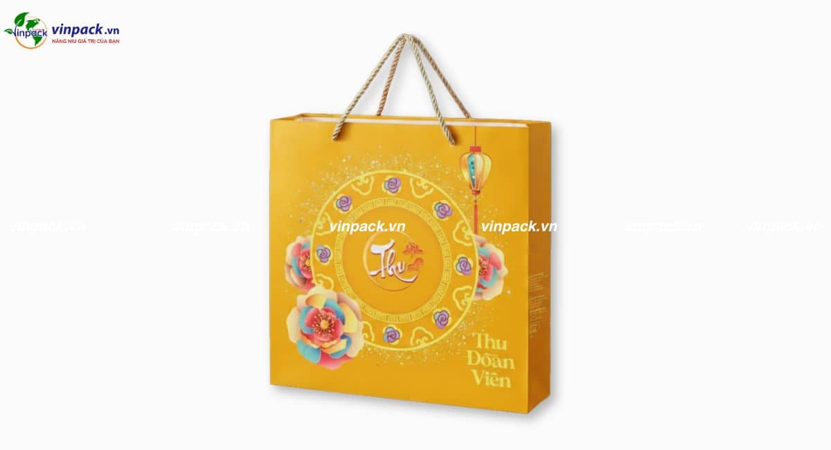 Túi giấy trung thu màu vàng có quai xách in họa tiết trăng rằm