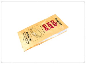 Túi đựng bánh mì dài màu vàng in chữ và hình minh họa bánh